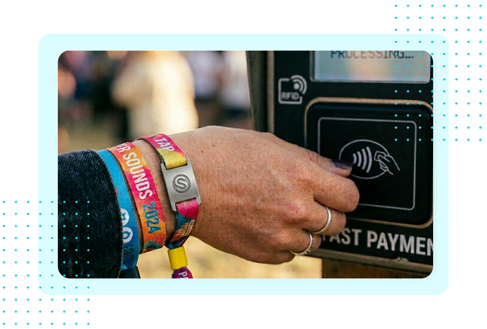 Festival-goer tapping an RFID wristband on a contactless reader, representing FaciliPay solutions for festivals and events.