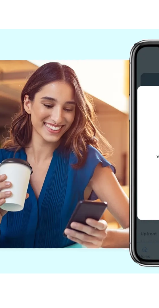 Smiling customer viewing a FaciliPay app confirmation showing a successful account top-up with a loyalty bonus credit.