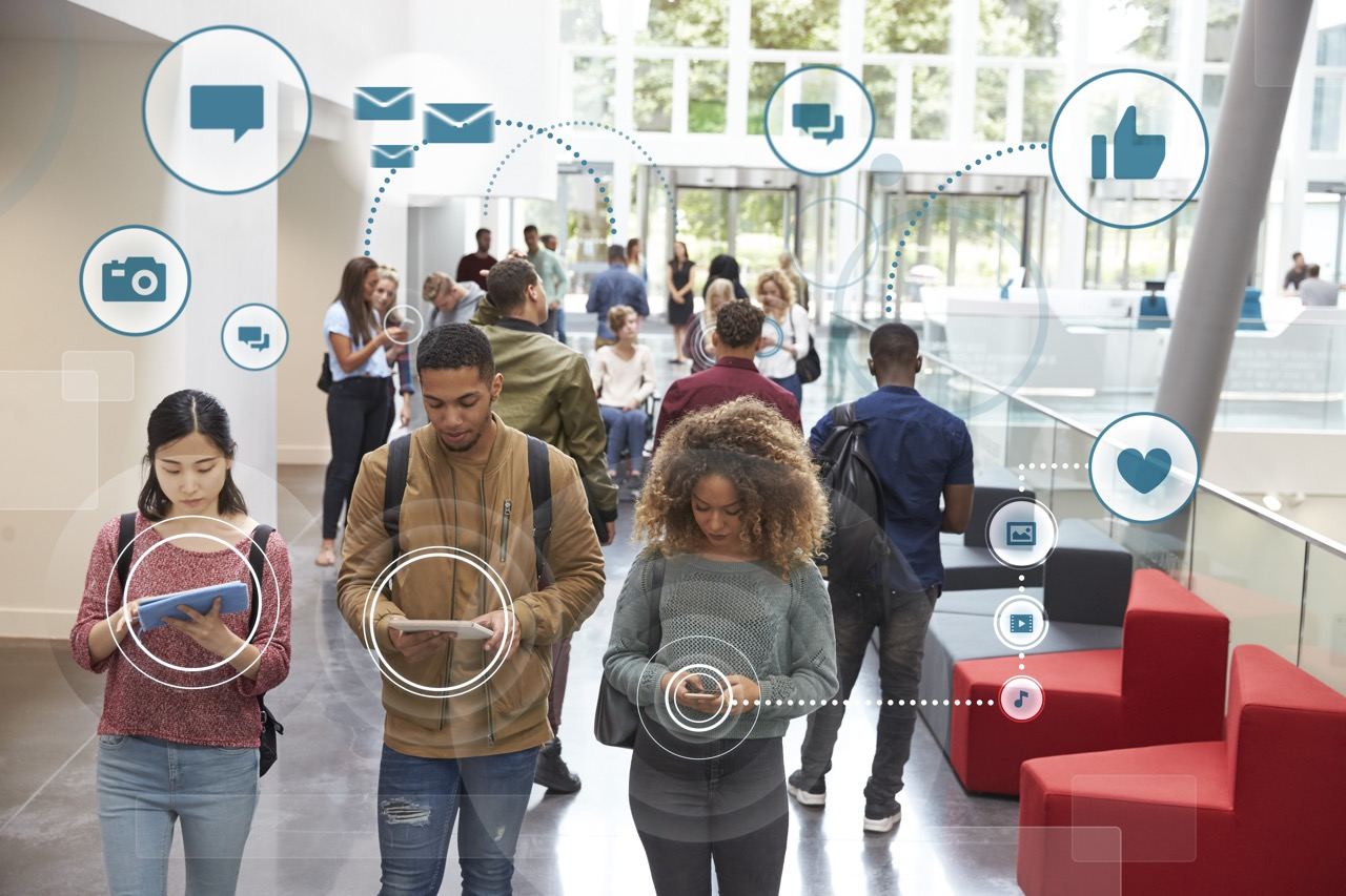 People using social media on mobile devices