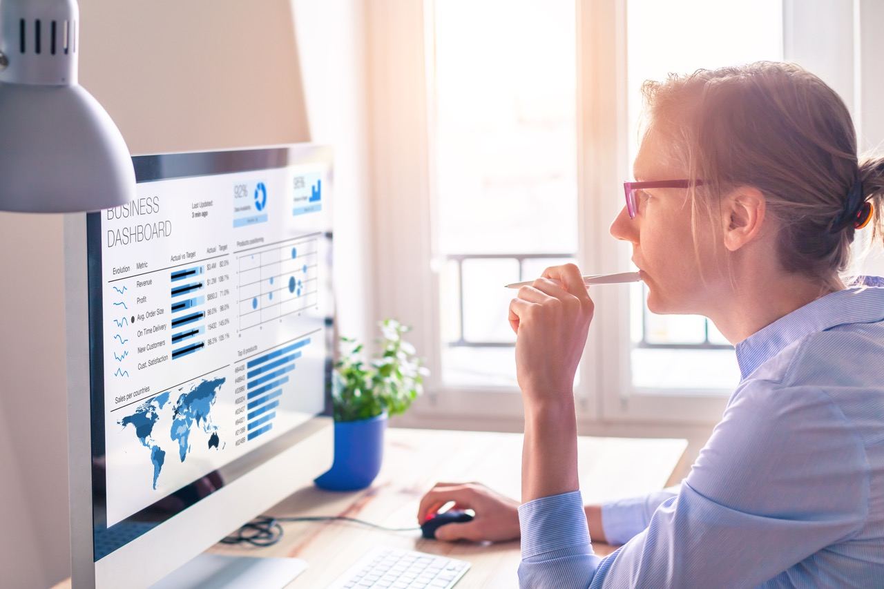 Business professional reviewing analytics dashboard